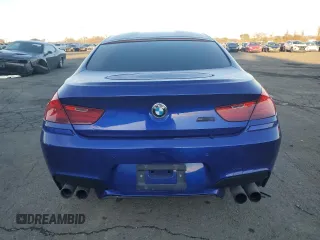 2014 BMW M6 z VIN WBS6C9C5XEDV73722, wystawiony jako Copart lot #87202664 z przebiegiem 68 283 mil mil oraz Szkoda całkowita • Salvage title. Historia ofert i sprzedaży dostępna na DreamBid. Obrazek 6.