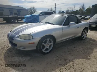 2003 Mazda MX-5 Miata Cloth with VIN JM1NB353430304103, listed as a Copart auction lot 50574245 with Not provided miles and Salvage title. Bid and sale history available at DreamBid. Image 1.