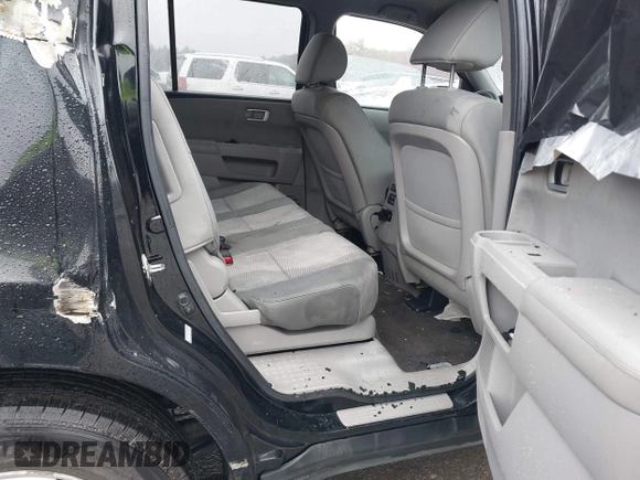 2012 Honda Pilot LX with VIN 5FNYF4H27CB038765, listed as a IAAI auction lot 41963157 with 209,965 mi miles and . Bid and sale history available at carsss.com. Image 8.