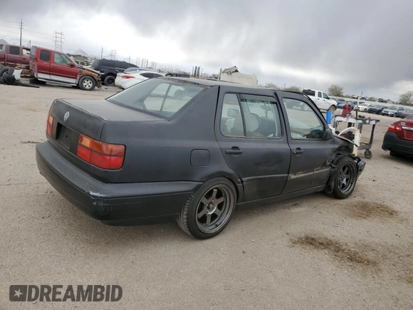 1996 Volkswagen Jetta с VIN 3VWRA81H5TM069238, выставлен на аукционе Copart как лот 42831195 с пробегом 226 935 миль миль и Списание • Salvage title. История ставок и продаж доступна на DreamBid. Изображение 3.