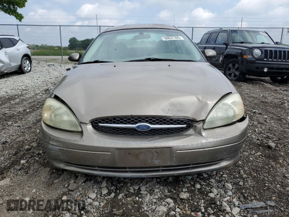 2003 Ford Taurus SES Standard z VIN 1FAFP55U33A123732, wystawiony jako Copart lot #58837395 z przebiegiem 169 159 mil mil oraz Szkoda całkowita • Salvage title. Historia ofert i sprzedaży dostępna na DreamBid. Obrazek 5.