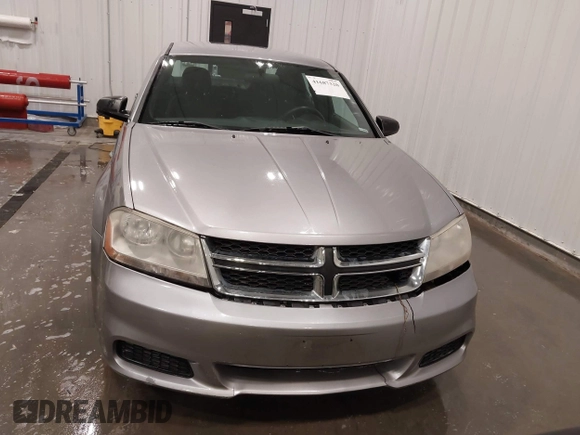 2014 Dodge Avenger SE with VIN 1C3CDZAB4EN148429, listed as a IAAI auction lot 41687320 with 149,084 mi miles and . Bid and sale history available at DreamBid. Image 13.