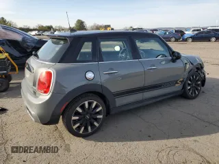 2018 MINI Hardtop 4 Door Cooper S с VIN WMWXU3C58J2F50385, выставлен на аукционе Copart как лот 51168775 с пробегом 77 091 миль миль и Списание • Salvage title. История ставок и продаж доступна на DreamBid. Изображение 3.