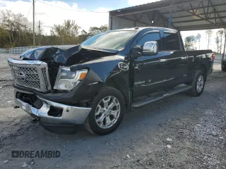 2016 Nissan Titan XD PRO-4X with VIN 1N6BA1F40GN510168, listed as a Copart auction lot 81030354 with 224,093 mi miles and Salvage Title. Bid and sale history available at carsss.com. Image 1.