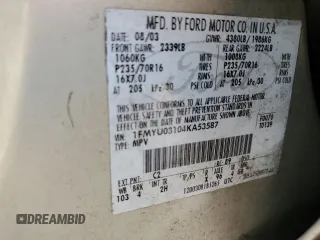 2004 Ford Escape XLT with VIN 1FMYU03104KA53587, listed as a Copart auction lot 51777385 with 154,102 mi miles and Salvage Title. Bid and sale history available at carsss.com. Image 13.