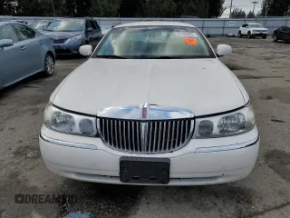 2001 Lincoln Town Car Executive z VIN 1LNHM81W91Y729914, wystawiony jako Copart lot #41593085 z przebiegiem 144 950 mil mil oraz Czysty tytuł • Clean title. Historia ofert i sprzedaży dostępna na DreamBid. Obrazek 5.