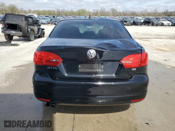 2014 Volkswagen Jetta Sedan SE with VIN 3VWD17AJ8EM392001, listed as a Copart auction lot 51124475 with 131,766 mi miles and Salvage Title. Bid and sale history available at carsss.com. Image 6.