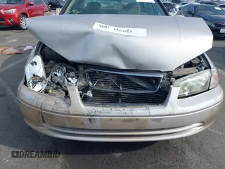 2001 Toyota Camry CE z VIN 4T1BG22K51U083381, wystawiony jako IAAI lot #41482936 z przebiegiem 84 219 mil mil oraz . Historia ofert i sprzedaży dostępna na DreamBid. Obrazek 6.
