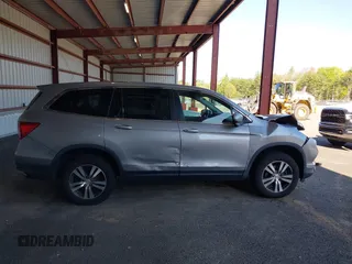 2017 Honda Pilot EX-L with VIN 5FNYF6H56HB063329, listed as a IAAI auction lot 42231498 with 179,695 mi miles and . Bid and sale history available at DreamBid. Image 13.