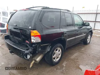 2008 GMC Envoy SLE1 with VIN 1GKDS13S282118764, listed as a IAAI auction lot 41285146 with 109,603 mi miles and . Bid and sale history available at DreamBid. Image 4.