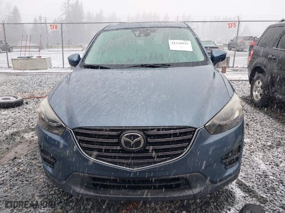2016 Mazda CX-5 Grand Touring with VIN JM3KE4DY4G0687230, listed as a IAAI auction lot 41510915 with NaN miles. Bid and sale history available at carsss.com. Image 13.