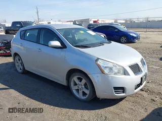 2009 Pontiac Vibe w/1SB with VIN 5Y2SP67019Z407279, listed as a IAAI auction lot 41790808 with 146,774 mi miles. Bid and sale history available at carsss.com. Image 1.