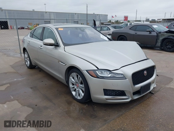 2017 Jaguar XF 35t Premium with VIN SAJBD4BV4HCY27802, listed as a IAAI auction lot 41076758 with 106,298 mi miles. Bid and sale history available at carsss.com. Image 1.