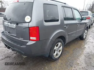 2015 Honda Pilot EX-L with VIN 5FNYF4H51FB064583, listed as a IAAI auction lot 41977746 with 120,398 mi miles and . Bid and sale history available at carsss.com. Image 4.