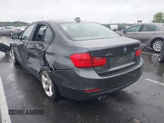 2014 BMW 3 Series 328i xDrive z VIN WBA3B5G51ENS09342, wystawiony jako IAAI lot #42270723 z przebiegiem 169 064 mil mil oraz . Historia ofert i sprzedaży dostępna na DreamBid. Obrazek 3.