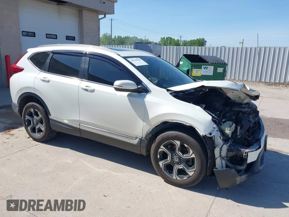 2018 Honda CR-V Touring with VIN 2HKRW2H92JH662753, listed as a IAAI auction lot 39538586 with 83,202 mi miles. Bid and sale history available at carsss.com. Image 1.
