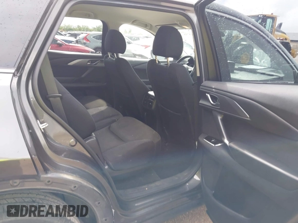 2016 Mazda CX-9 Sport with VIN JM3TCABY5G0122478, listed as a IAAI auction lot 42115795 with 134,980 mi miles and . Bid and sale history available at DreamBid. Image 8.