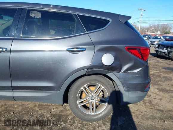 2017 Hyundai Santa Fe 2.4L with VIN 5XYZTDLB0HG453575, listed as a IAAI auction lot 41036334 with 114,031 mi miles and . Bid and sale history available at DreamBid. Image 17.