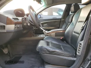 2003 BMW 7 Series 745i with VIN WBAGL63483DP65989, listed as a Copart auction lot 82057064 with 60,735 mi miles and Salvage title. Bid and sale history available at DreamBid. Image 7.