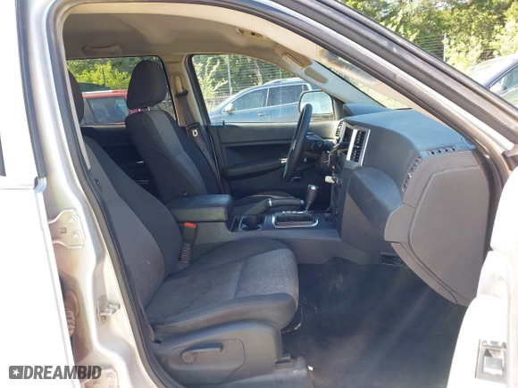 2009 Jeep Grand Cherokee Laredo with VIN 1J8GS48K99C528145, listed as a IAAI auction lot 42077024 with 167,588 mi miles. Bid and sale history available at carsss.com. Image 5.