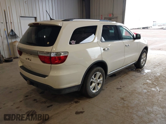 2012 Dodge Durango SXT with VIN 1C4RDJAGXCC295138, listed as a IAAI auction lot 42333094 with 96,581 mi miles and . Bid and sale history available at DreamBid. Image 4.