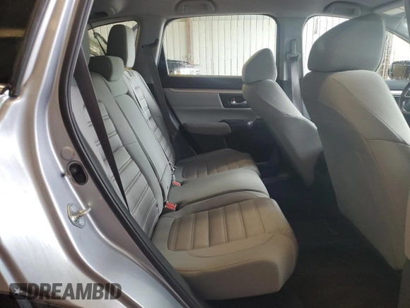 2020 Honda CR-V LX z VIN 7FARW2H22LE006657, wystawiony jako Copart lot #56817375 z przebiegiem 106 500 mil mil oraz Szkoda całkowita • Salvage title. Historia ofert i sprzedaży dostępna na DreamBid. Obrazek 11.