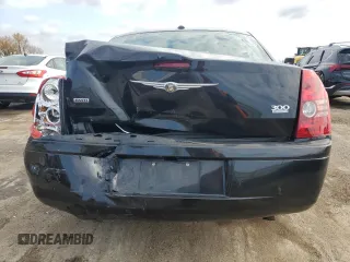 2009 Chrysler 300 with VIN 2C3LK33V19H614083, listed as a Copart auction lot 77529014 with 188,125 mi miles and Salvage title. Bid and sale history available at DreamBid. Image 6.