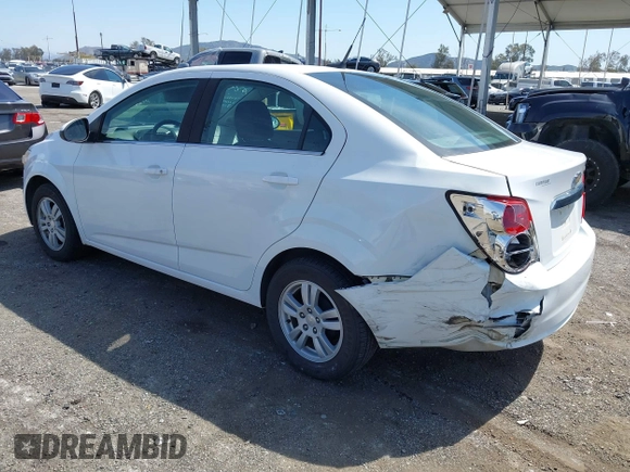 2014 Chevrolet Sonic LT with VIN 1G1JC5SH9E4212898, listed as a IAAI auction lot 41852112 with 121,382 mi miles and . Bid and sale history available at DreamBid. Image 3.