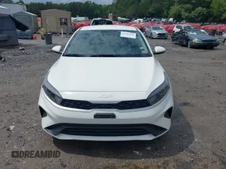 2023 Kia Forte LXS z VIN 3KPF24AD5PE677916, wystawiony jako IAAI lot #42381605 z przebiegiem 39 662 mil mil oraz . Historia ofert i sprzedaży dostępna na DreamBid. Obrazek 11.