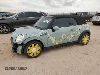 2014 MINI Convertible S with VIN WMWZP3C56ET707425, listed as a Copart auction lot 50894965 with 100,116 mi miles and Salvage Title. Bid and sale history available at DreamBid. Image 1.