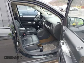 2016 Jeep Compass Latitude with VIN 1C4NJDEB8GD695268, listed as a IAAI auction lot 41724921 with 137,118 mi miles. Bid and sale history available at carsss.com. Image 5.