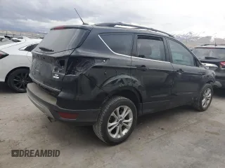 2017 Ford Escape SE with VIN 1FMCU0GD7HUE72044, listed as a Copart auction lot 48565255 with 125,052 mi miles and Salvage Title. Bid and sale history available at DreamBid. Image 3.