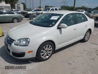 2010 Volkswagen Jetta Sedan Limited with VIN 3VWAZ7AJ7AM148894, listed as a IAAI auction lot 42173838 with 113,415 mi miles. Bid and sale history available at carsss.com. Image 2.