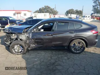 2019 BMW X4 M40i z VIN 5UXUJ5C54KLJ64077, wystawiony jako IAAI lot #41012233 z przebiegiem 40 737 mil mil oraz . Historia ofert i sprzedaży dostępna na DreamBid. Obrazek 13.