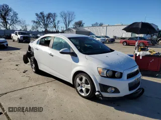2014 Chevrolet Sonic LTZ with VIN 1G1JE5SH8E4118134, listed as a Copart auction lot 86915364 with 116,484 mi miles and Salvage Title. Bid and sale history available at carsss.com. Image 4.