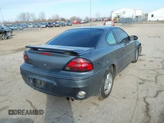 2005 Pontiac Grand Am GT with VIN 1G2NW12E65M156857, listed as a IAAI auction lot 41548935 with 199,420 mi miles. Bid and sale history available at carsss.com. Image 4.