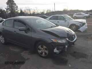 2014 Honda Civic Sedan LX with VIN 19XFB2F5XEE031502, listed as a IAAI auction lot 41487300 with 219,108 mi miles. Bid and sale history available at carsss.com. Image 1.