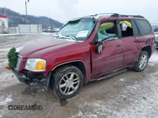 2006 GMC Envoy Denali with VIN 1GKET63M162337213, listed as a IAAI auction lot 41292801 with 133,201 mi miles. Bid and sale history available at carsss.com. Image 2.