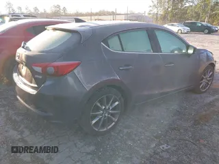 2018 Mazda 3 Touring with VIN 3MZBN1L32JM235162, listed as a IAAI auction lot 41596278 with 144,784 mi miles and . Bid and sale history available at DreamBid. Image 4.