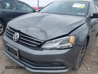 2016 Volkswagen Jetta Sport z VIN 3VWD17AJ2GM399335, wystawiony jako IAAI lot #42077435 z przebiegiem 92 284 mil mil oraz . Historia ofert i sprzedaży dostępna na DreamBid. Obrazek 6.