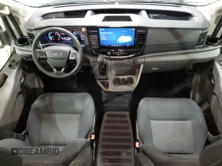 2023 Ford Transit Passenger XL with VIN 1FBAX2C81PKB30711, listed as a Copart auction lot 77797054 with 18,161 mi miles and Clean Title. Bid and sale history available at carsss.com. Image 8.