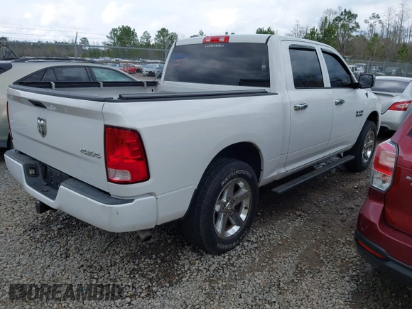 2015 Ram 1500 Tradesman with VIN 1C6RR7KG8FS648142, listed as a IAAI auction lot 41647459 with 100,696 mi miles and . Bid and sale history available at DreamBid. Image 4.