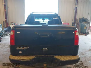 2005 Ford Explorer Sport Trac XLS with VIN 1FMZU77K45UB32573, listed as a IAAI auction lot 41760637 with 216,186 mi miles. Bid and sale history available at carsss.com. Image 16.