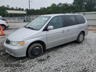 2004 Honda Odyssey EX-L with VIN 5FNRL18044B069774, listed as a Copart auction lot 57096535 with 165,307 mi miles and Salvage title. Bid and sale history available at DreamBid. Image 1.