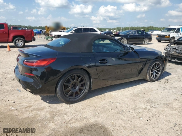 2022 BMW Z4 sDrive30i with VIN WBAHF3C05NWX43513, listed as a Copart auction lot 53292655 with 9,657 mi miles and Salvage Title. Bid and sale history available at carsss.com. Image 3.