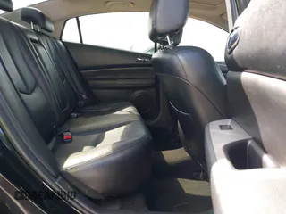 2009 Mazda 6 S Grand Touring with VIN 1YVHP82BX95M21939, listed as a IAAI auction lot 41527269 with 154,544 mi miles and . Bid and sale history available at DreamBid. Image 8.