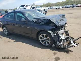 2014 BMW 3 Series Gran Turismo 335i xDrive with VIN WBA3X9C52ED153402, listed as a Copart auction lot 52747504 with 94,923 mi miles and Salvage Title. Bid and sale history available at carsss.com. Image 4.