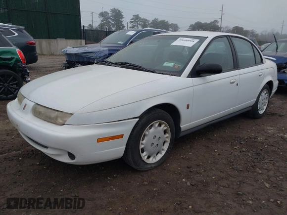 1997 Saturn SL z VIN 1G8ZK5272VZ270692, wystawiony jako IAAI lot #41926086 z przebiegiem 109 329 mil mil oraz . Historia ofert i sprzedaży dostępna na DreamBid. Obrazek 2.