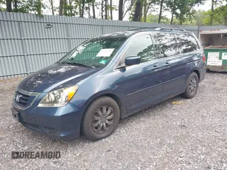 2010 Honda Odyssey EX with VIN 5FNRL3H46AB080950, listed as a IAAI auction lot 42658218 with 185,742 mi miles and . Bid and sale history available at DreamBid. Image 2.