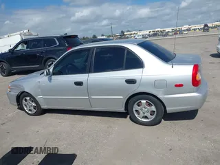2002 Hyundai Accent GL with VIN KMHCG45C82U268756, listed as a IAAI auction lot 41569829 with 89,752 mi miles. Bid and sale history available at carsss.com. Image 14.